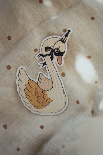 Mrs Mighetto Silitysmerkki, Dear Swan