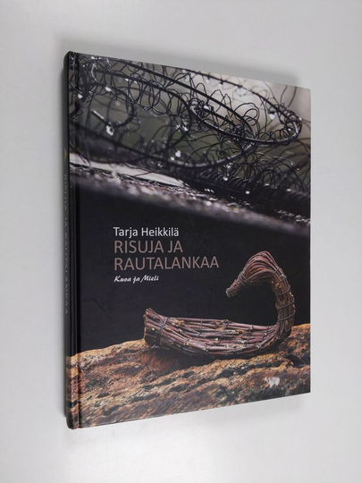 Tarja Heikkilä : Risuja ja rautalankaa